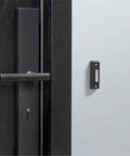 LED Lighted Doorbell Button In Black Plastic on a modern door with handle, Classic Rectangular Design, BT4BL Replacement