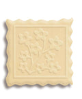 Cookie embossed with spring flowers design, demonstrating the Mini Embossing Rolling Pin With Spring Flowers Design For Cookies.