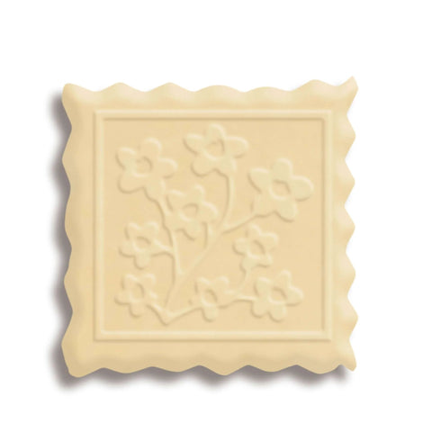 Cookie embossed with spring flowers design, demonstrating the Mini Embossing Rolling Pin With Spring Flowers Design For Cookies.