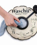 No Sweat Pocket Size Manual Travel Clothes Washer For Camping And Vanlife Lightweight Portable Mini Hand Wash Kit Eco Friendly Essentials Gear Clean Up Pack Light Wash Anywhere with a hand washing a sock.