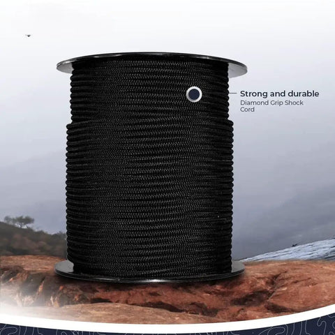 Diamond Grip Black Bungee Cord One Eighth Inch by One Hundred Feet Ultra Stretch Elastic Shock Cord spool on outdoor rock