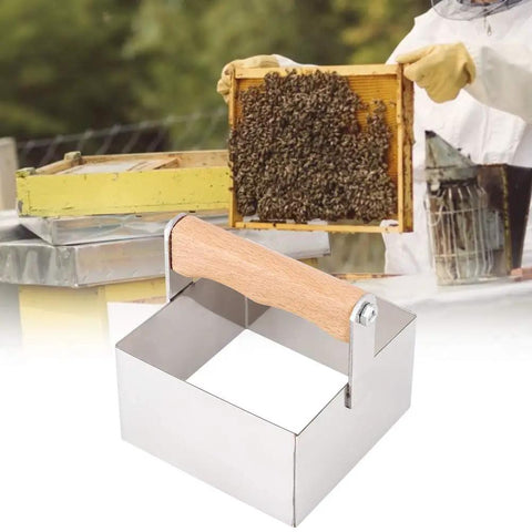 Stainless Steel Honeycomb Cutter For Beekeeping with beekeeping scene, rectangle honey cutter tool with smooth edges and wooden handle.