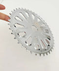 Steel Bicycle Chainring Sprocket For One Piece Cranksets 40T Or 44T Black Finish With 2mm Teeth And Two Point Five Millimeter Thickness Heavy Duty Replacement Fits Half Inch By One Eighth Inch Chain For 2 Inch Cup Cranks Pteris Style