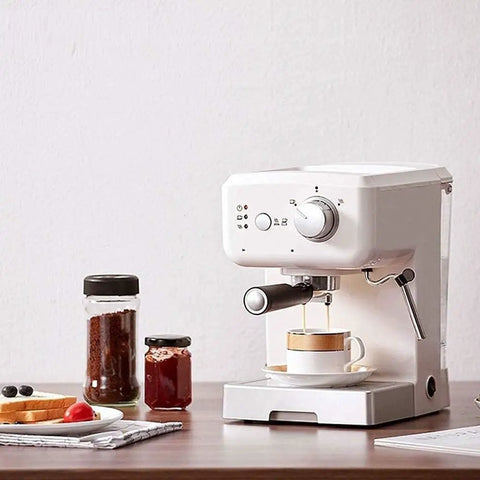 Beige Fully Automatic Coffee Machine With Built In Grinder And Milk Frother For Home Use on a kitchen countertop brewing espresso.
