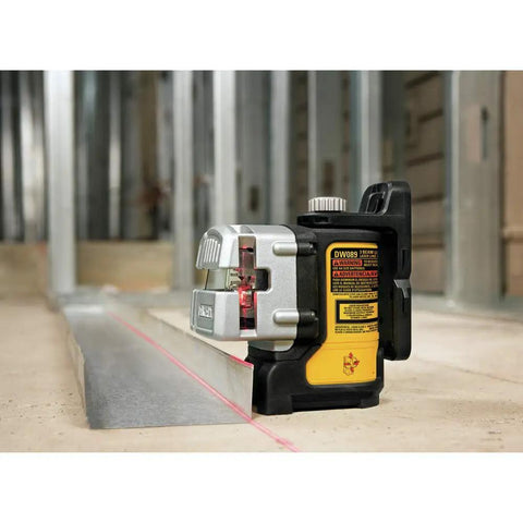 Three Beam Line Laser With Self Leveling And Magnetic Pivot Bracket, 2x Brighter Diodes For Superior On Site Visibility, Delivers Precise 90 Degree Layout On Metal Surfaces, Pro Grade Framing, Cabinetry And Installations DW089K on construction floor
