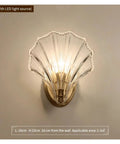 Crystal Wall Lights Living Room Bedroom Lamp Sconces Lighting - Shell Copper Light Fixture Corridor Decoration T-155 with LED source on a wall.