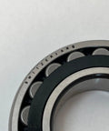 Close-up of Heavy Duty Spherical Roller Bearing 22209ES TVPB W33 with polyamide cage and Switzerland engraving.