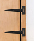 Heavy Duty 12 Inch T Hinges Two Pack Steel Barn Gate Hardware With Screws For Shed Doors and Outdoor Wood Projects on a wooden door.