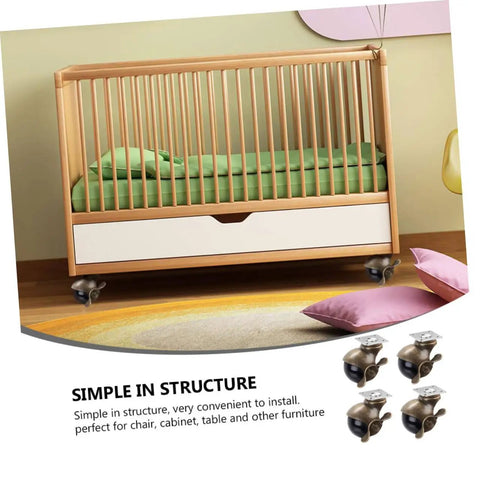 Vintage Brass Top Plate Casters Two Inch Four Pack Heavy Duty Workbench Wheels under a wooden crib, showcasing smooth rolling capability.