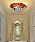 Dragonfly 3 Light Flush Mount Ceiling Light With Orange Stained Glass Shade 16 Inch Diameter Glass Fixture in elegant room