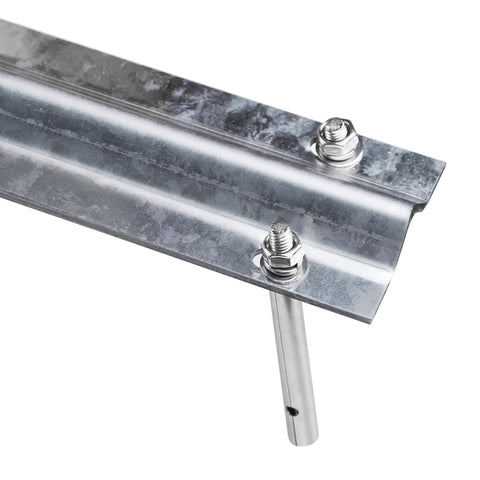 Close-up of galvanized inverted sliding door track with expansion bolts, 12 ft rail for sliding doors and driveway gates.
