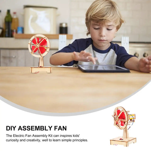 Hands On DIY Electric Fan Assembly Kit For STEM Classrooms And Science Projects on a table with a child observing.