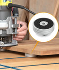 Round T Track Stop 2 Pack Pro Grade for woodworking, shown stabilizing a wooden panel during routing with rubber base visible.