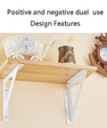 Solid Wrought Iron Shelf Brackets holding a wooden shelf, showcasing dual design; perfect for storage in kitchens or porches.