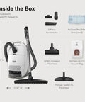 Inside the box of a Premium Bagged Canister Vacuum For Hard Floors And Thin Carpet Featuring XL Parquet Brush Universal Floorhead.