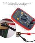 Alligator Clip To Banana Plug Multimeter Lead Set With Mini Hooks connected to a battery and multimeter