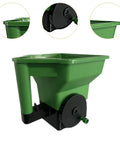 Green plastic Handheld Garden Spreader For Seeds, Fertilizer And Salt Portable Manual Dispenser With Easy Grip shown from side view.