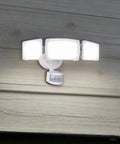 Patriot Lighting White Tri-Head 180° Motion Sensing LED White Security Flood Light Ceiling Light with three bright panels.