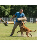 Trainer using Dog Bite Sleeve Training Pro Grade For Large Dogs Heavy Duty Jute Gear With Safe Padded Arm Sleeve Great For Pit Bull German Shepherd K9 Puppies And Young Dogs Tugging Biting Play Pink Trim outdoors