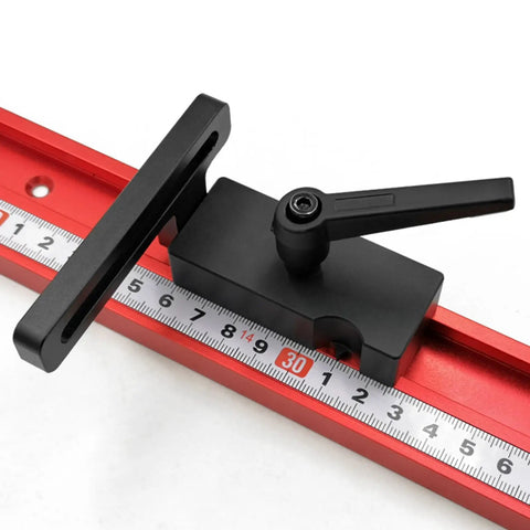 Aluminum Stop Block for Miter Track and 45 Type Positioner on red track with ruler detail, Pro Grade Tool for Precision Woodworking