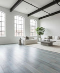 Top Tier Light Oak Reactive Water Based Wood Stain Zero VOC Heavy Duty 55 Gallon Drum on smooth interior floors in a modern living room.