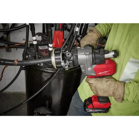 Milwaukee M18 Cordless Cable Stripper Bare Tool Adjustable Depth Gauge removing insulation from 2.1 inch wire.