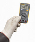 Palm Sized Digital Multimeter Handy And Snappy For Voltage And Current Readings With Resistance Continuity And Capacitance Tests 10 Amp AC And DC Current Measurement Data Hold One Hand Operation India Version held in gloved hand