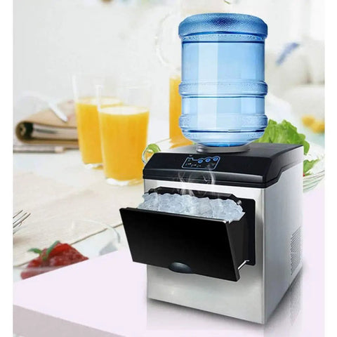 Smooth Operator Countertop Ice Maker Churns Out Twenty Five Kilograms Of Bullet Ice Daily In Just Twelve Minutes With Hassle Free Touch Controls, with ice produced.