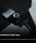 Electric Vertical BBQ Smoker With Analog Temperature Control 30 Inch Black Unit Featuring control dial close-up