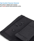 Close-up of DSLR Battery And Memory Card Holder Pouch with water droplets on polyester material, highlighting durability.