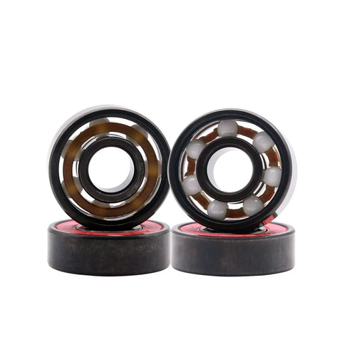 Front view of two Z-First 608RS hybrid black ceramic bearings with white balls; part of a four-pack