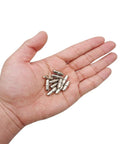 Heavy Duty Shelf Pins 120 Pack Nickel Plated Furniture Shelf Supports, 5mm x 16mm, in a hand for easy handling.