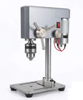 Ace Mini Bench Drill Press Delivering Sweet Variable Speed Control With Heavy Duty Chuck Grip For Zero Drama Woodworking Metal Drilling And Quick Jewelry Crafting Jobs, silver desktop drill with steel base.