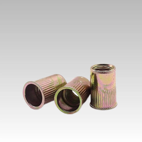100 Piece Carbon Steel Rivet Nuts Blind Insert Set With Flat Heads And Knurled Grip For 3/4 To 12mm Thick Sheet Metal Fastening Projects showing several rivet nuts with flat heads and knurled grip.