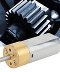 Tiny But Mighty DC 12V Mini Planetary Gearbox Motor With All Brass Reducer 6mm Shaft close-up on gears and shaft