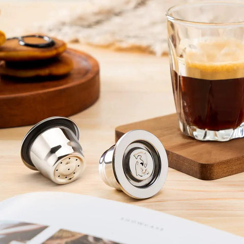 Stainless Steel Reusable Espresso Capsule Pod With Lid For Home Brewing Barista Grade Crema Style Coffee Capsule on table