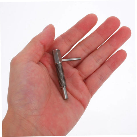 Tough Retractable Plunger Pin With Spring Return Knurled Handle Stainless Steel, held in hand for easy reference, size 54 x 29 x 9 mm.