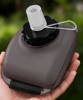 Handsfree Wrist Water Bottle For Outdoor Sports On The Go Hydration Gear showing 200ml size and silicone material in hand