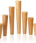 Four Pack Solid Oak Wood Table Legs, Four Inch Tapered Replacement Furniture Feet, set of eight wood legs with varying heights.