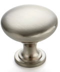 Close-up of a brushed nickel round zinc cabinet knob, part of 30 Pack Brushed Nickel Round Zinc Cabinet Knobs For Kitchen Bathroom Closet And Dresser Cabinets Easy Install Durable Hardware To Refresh Your Home With A Modern Classic Look And Everyday Functionality No Fuss.