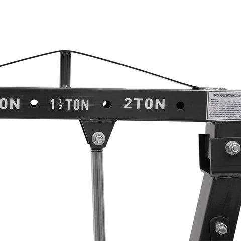Tough As Nails Folding Engine Hoist With Hydraulic Motor Crane Lift showing weight ratings up to 2 tons and strong carbon steel construction.