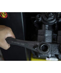 2 Piece X6 4 In 1 Black Oxide Spline Ratcheting SAE Wrench Set With 5 Degree Arc in use on machinery
