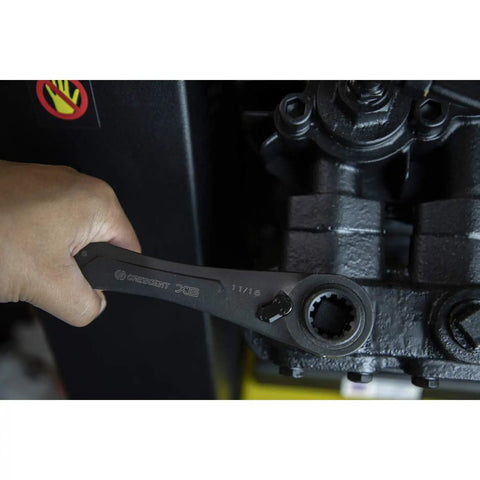 2 Piece X6 4 In 1 Black Oxide Spline Ratcheting SAE Wrench Set With 5 Degree Arc in use on machinery