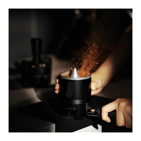 Espresso Gang Verified Shaker Funnel With Built In Dosing Cup For 58mm Portafilter distributing coffee grounds evenly.