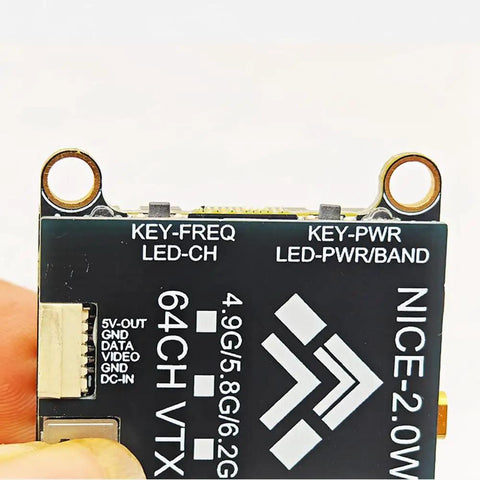 Close-up view of Hardcore 5.8G FPV VTX Transmitter 2W 64CH with TBS OSD PAL NTSC Support showing connector ports and labels.