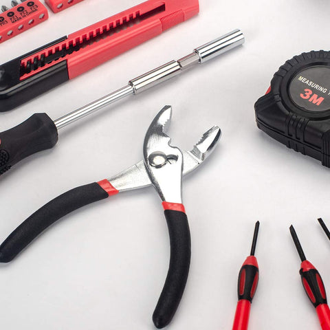 Close-up of 39 Piece General Tool Set For Home DIY Projects With Portable Red Toolbox Case Essential Household Hand Tool Kit.