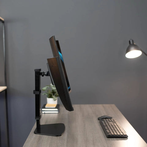 Durable Heavy Duty Freestanding Monitor Mount Desk Stand Rock Solid Height Adjustable Arm For 17 To 32 Inch Screens Portrait Landscape Tilt Swivel Vesa Plate Black with monitor on a desk