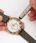 Using Silver Watch Crown Winder 3-4.5mm on a gold watch, demonstrating precise adjustment for professional repair.