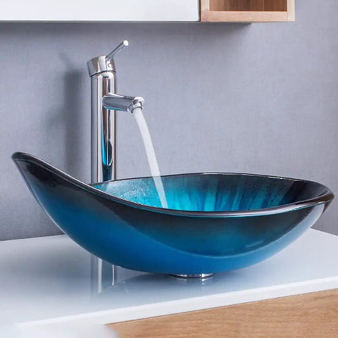 Modern Oval Glass Vessel Sink With Blue Line Stripes, Slick Countertop Washbasin Built On Badass Toughened Glass, showing water flow.