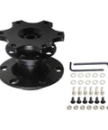 Universal Quick Release Steering Wheel Hub Adapter Kit With Anti Theft Six Bolt Boss Plate And Raised Spacers For Your Daily Whip And Weekend Builds In Matte Satin Black Finish, top view with mounting hardware.